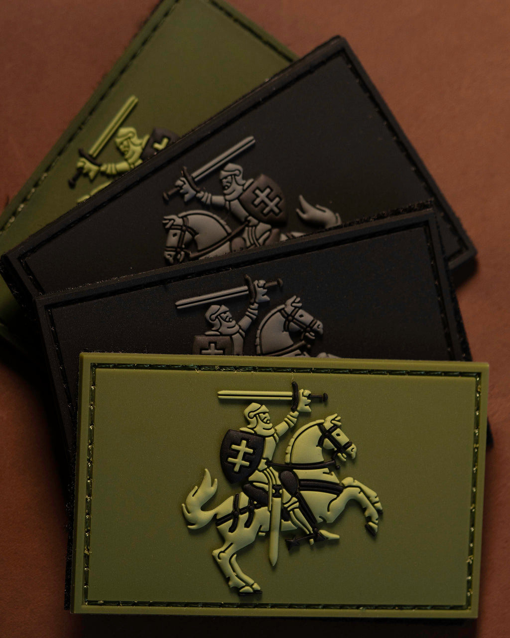 PVC patches featuring a raised 3D knight on horseback in tactical colors.