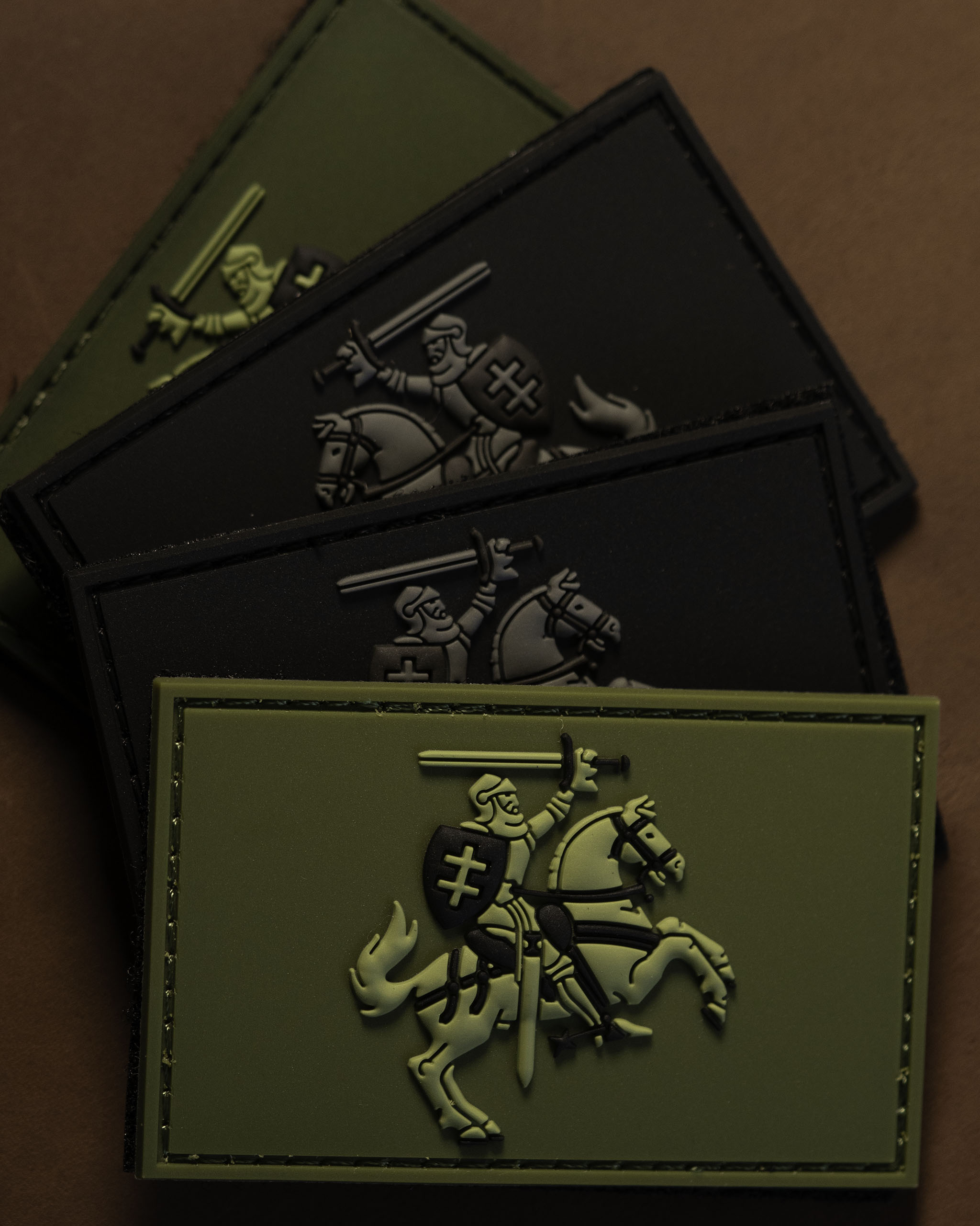 PVC patches featuring a raised 3D knight on horseback in tactical colors.
