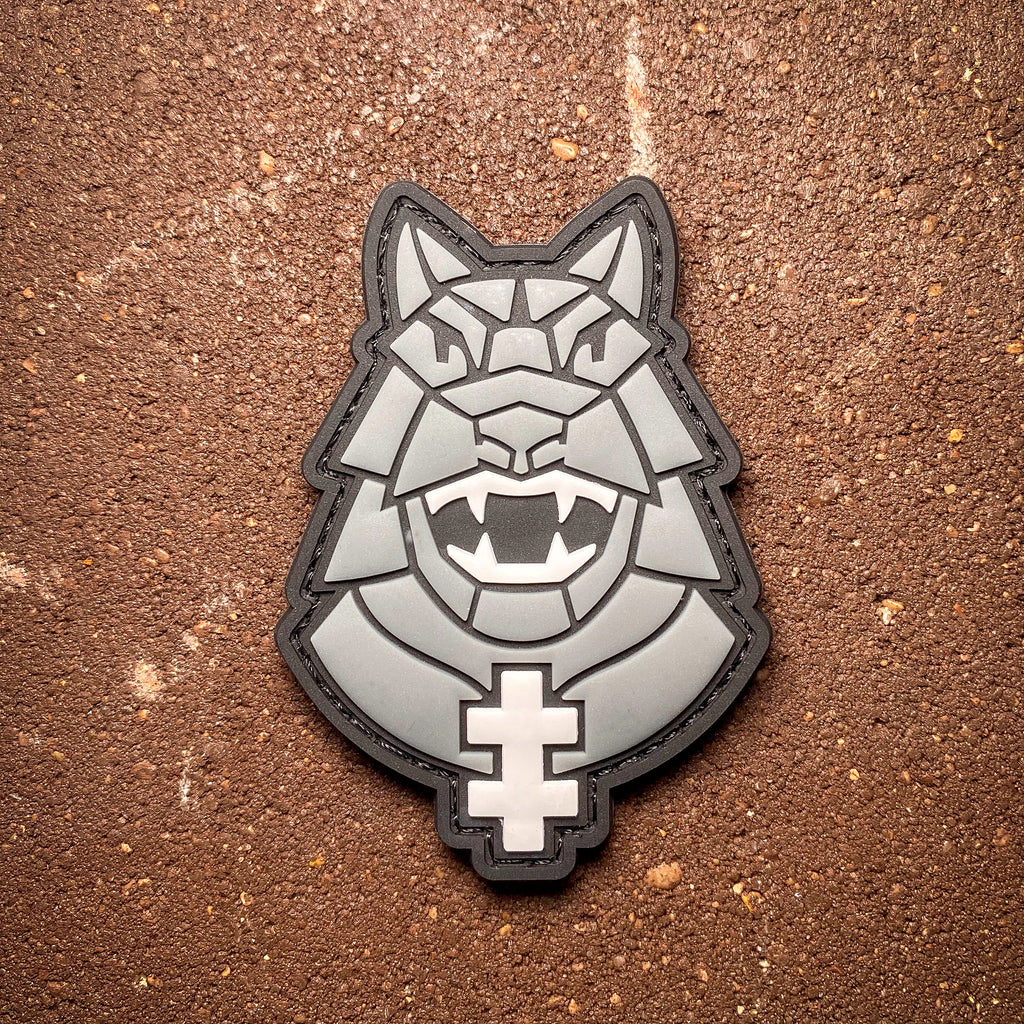 PVC patch featuring a 3D geometric Iron Wolf design in grey tones.