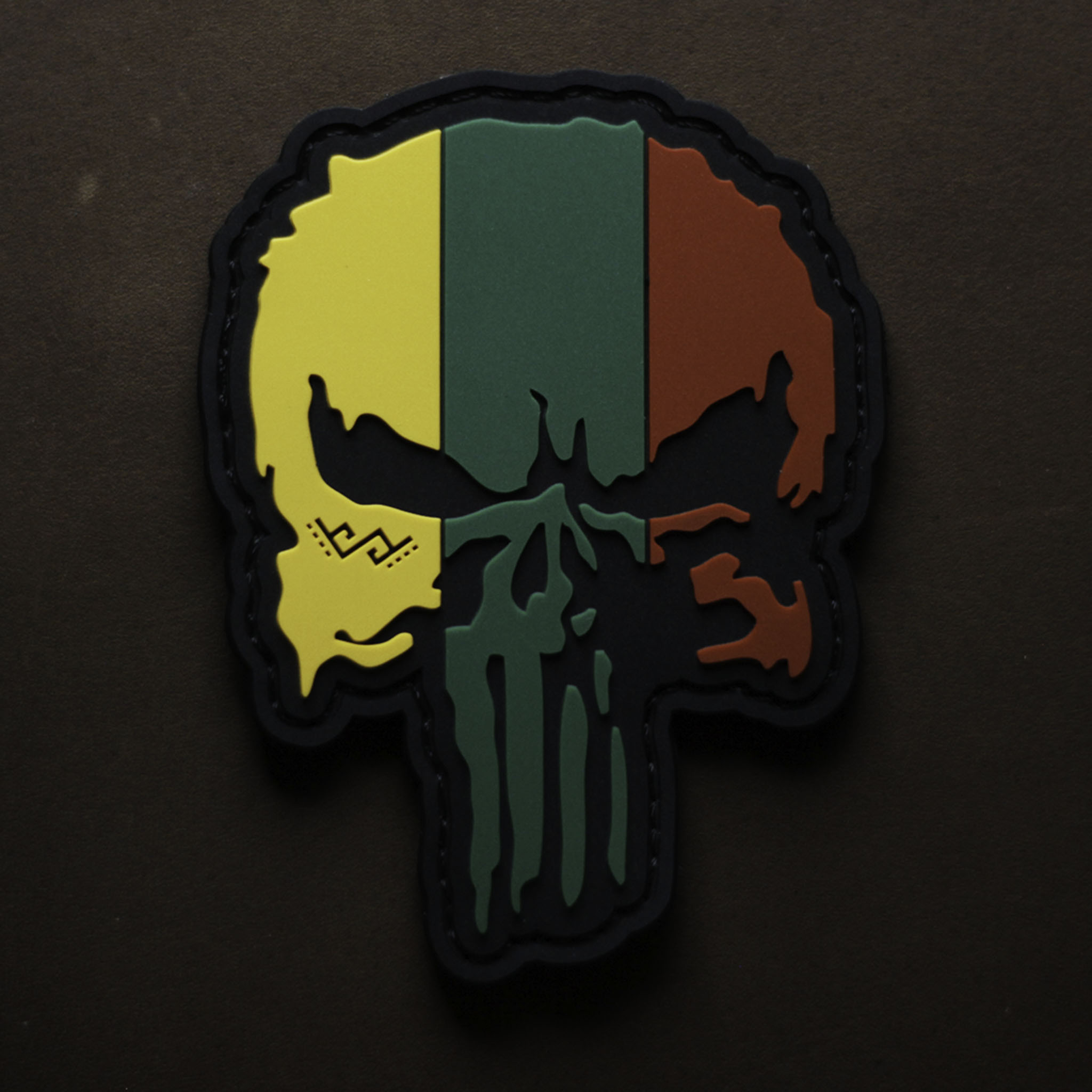 PVC patch showing a Punisher-style skull with Lithuanian flag colors and raised 2D details.