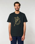 Man wearing a black t-shirt with a graphic design on a plain background